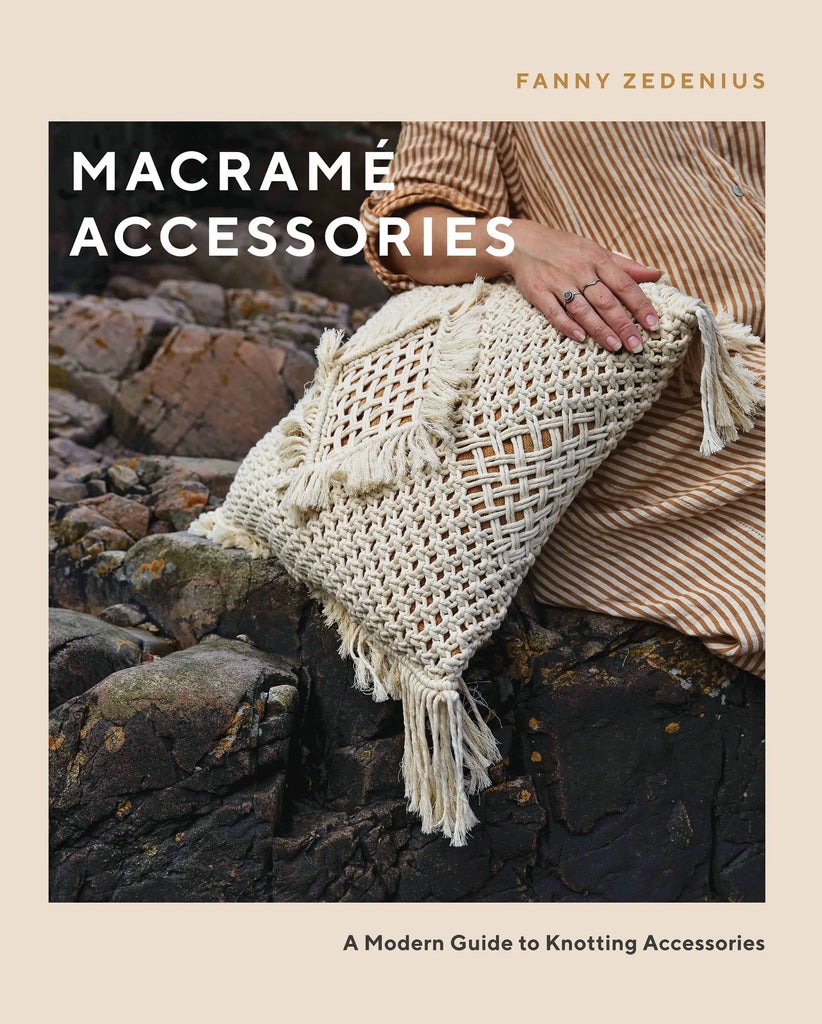 Book cover for 'macrame accessories' with a person sitting on rocks and holding a macrame pillow 