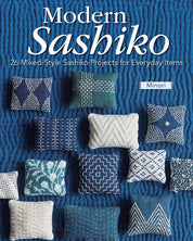 Book cover of 'Modern Sashiko' with fabric patterns on a blue background