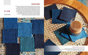 Kantha-style coasters on a wooden surface with a cup of coffee.