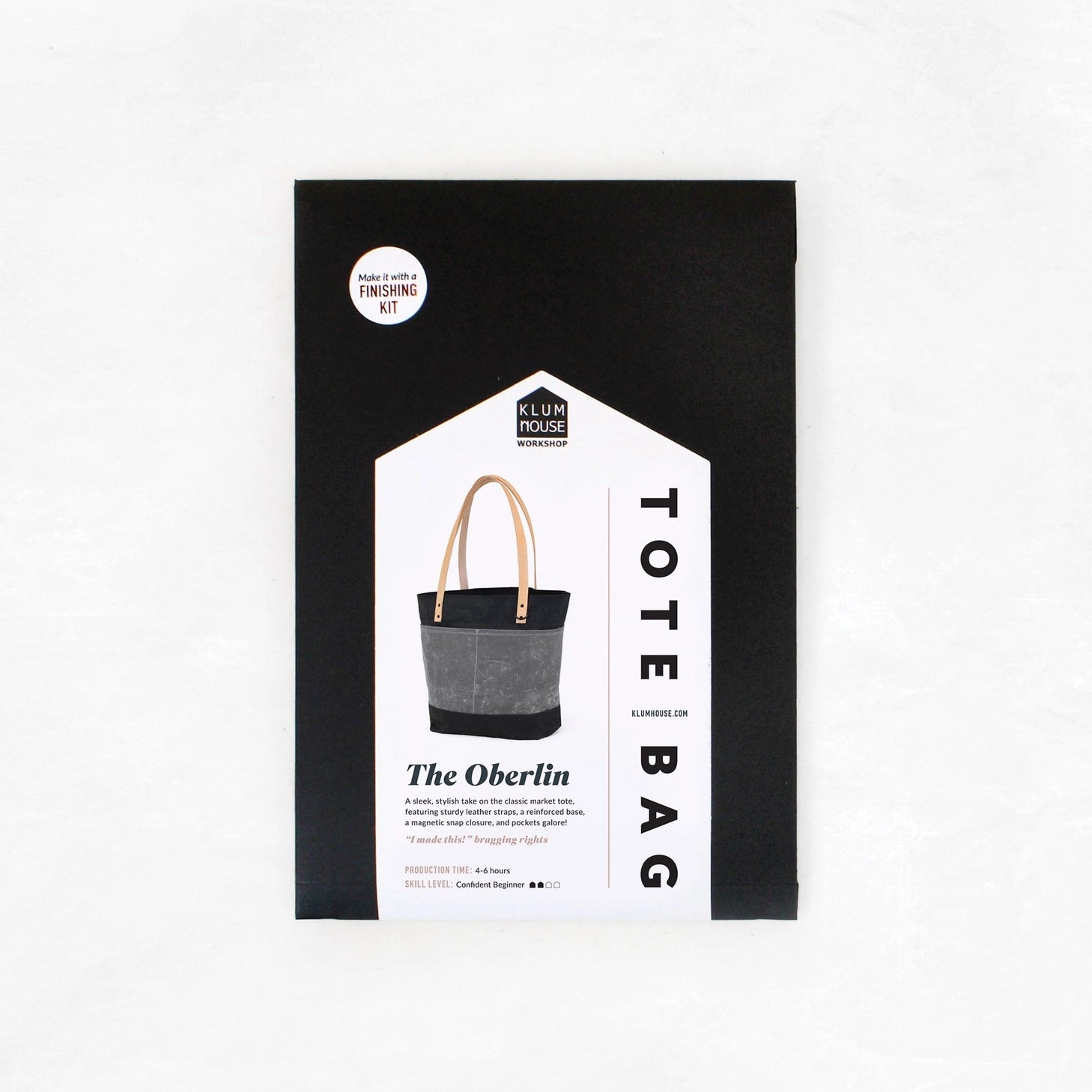 Klum House tote bag packaging on a white background