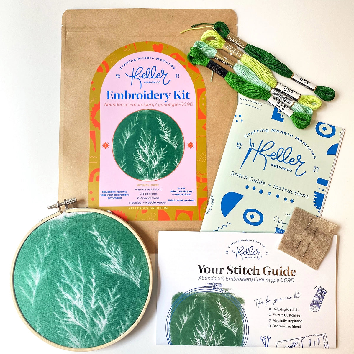 Embroidery kit with hoop, thread, and instructions on a white background