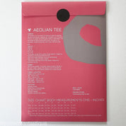 Pink and gray patterned fabric swatch with text on a white background