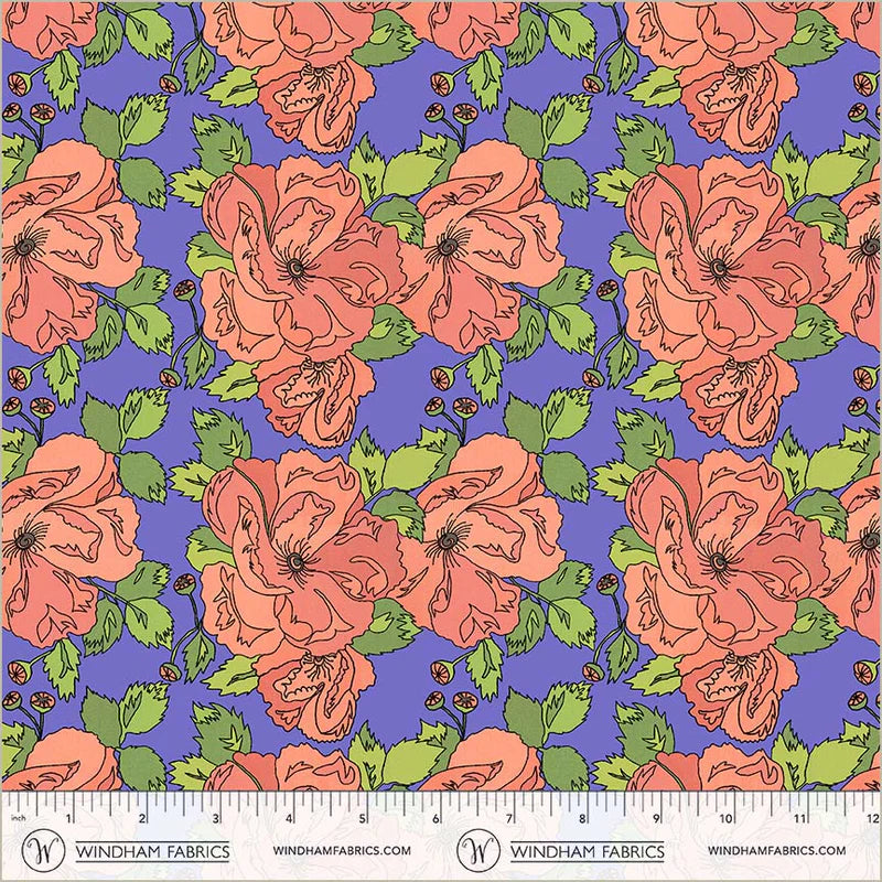 Fabric swatch with pink flowers on a periwinkle background with a ruler at the bottom.
