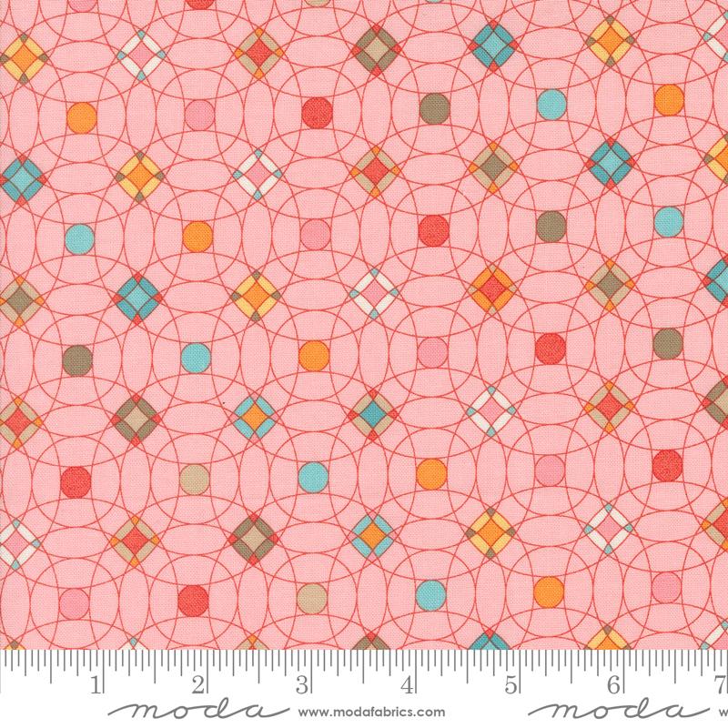 Overlapping circles on a pink background with colorful motifs at the crosspoints and centers