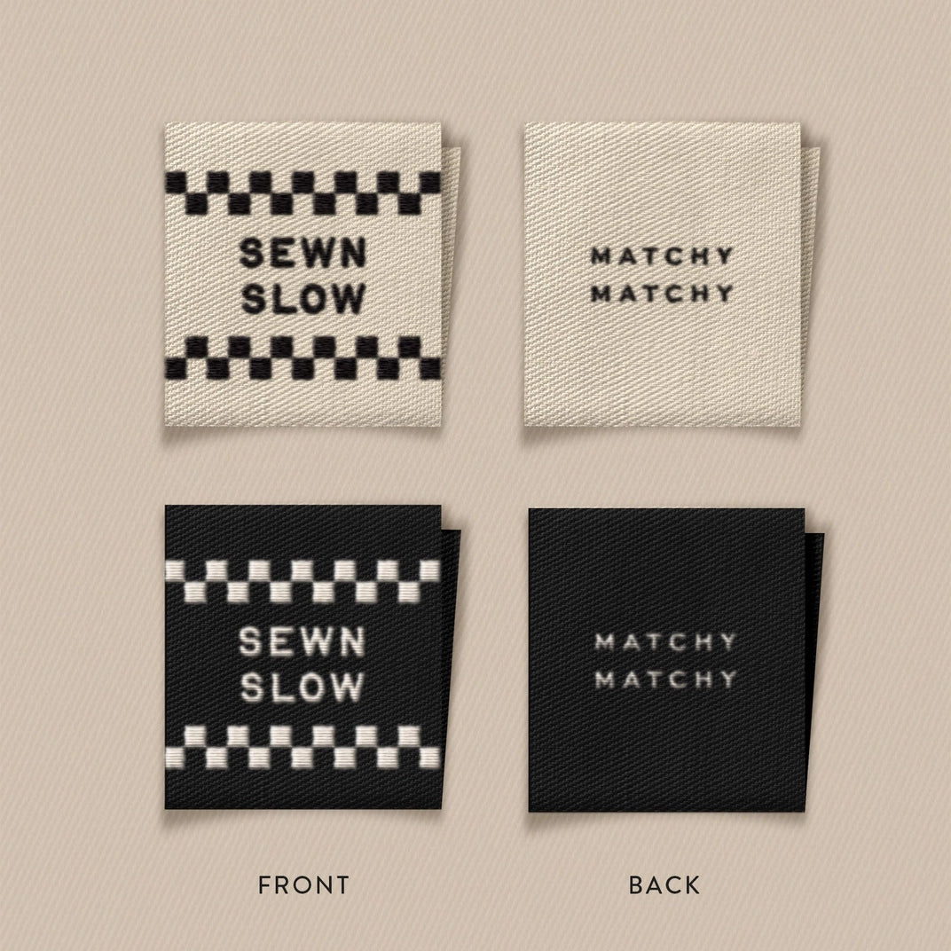 Two fabric labels with 'Sewn Slow' and 'Matchy Matchy' text on a beige background