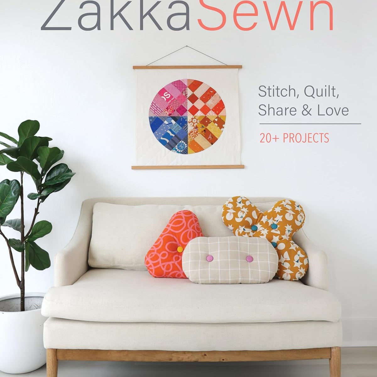Book cover of 'Zakka Sewn' with a couch and colorful pillows on a white background