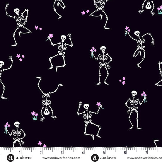Pattern of skeletons and flowers on a black background with Andover Fabrics label at the bottom.