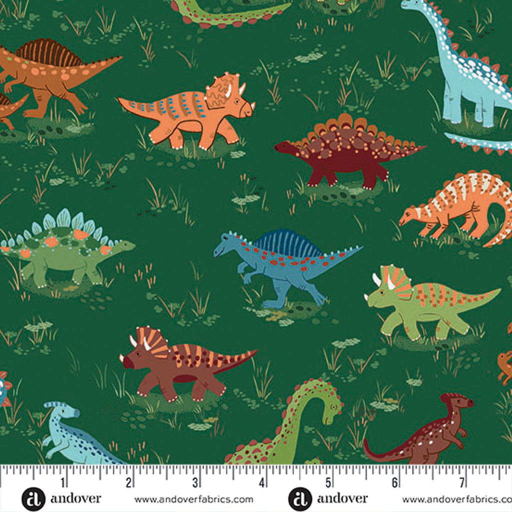Pattern of colorful dinosaurs on a green background with Andover Fabrics logo.