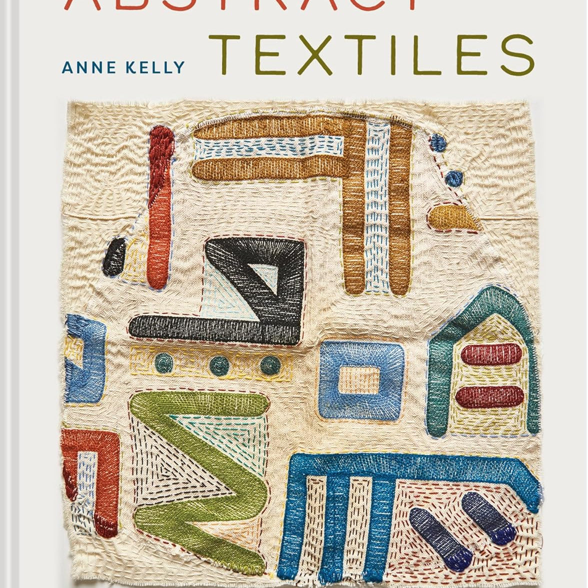 Book cover of 'Abstract Textiles' by Anne Kelly featuring a textile art piece with geometric shapes.
