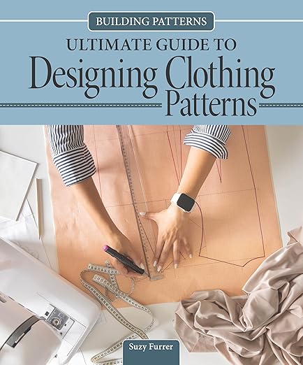 Book cover of 'Ultimate Guide to Designing Clothing Patterns' by Suzy Furrer with a person working on fabric.