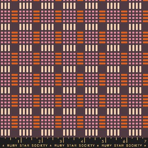 Patterned fabric with geometric design on a dark background, Ruby Star Society 