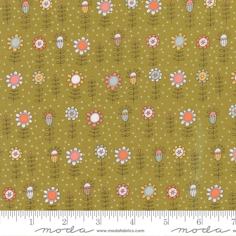 Floral pattern fabric with a ruler at the bottom for scale, featuring Moda label.