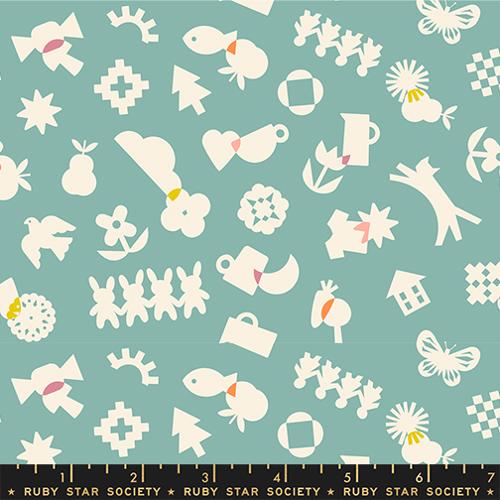 Patterned fabric with white shapes on a teal background, featuring Ruby Star Society label.