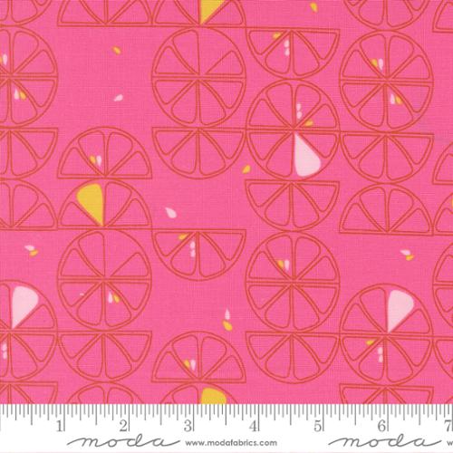 Fabric with orange outlines of lemon slices on a hibiscus pink background