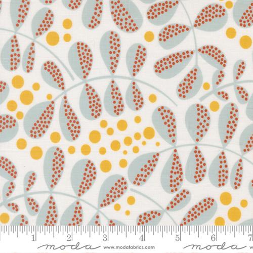 Fabric with blueish grey ferns on a coconut colered background