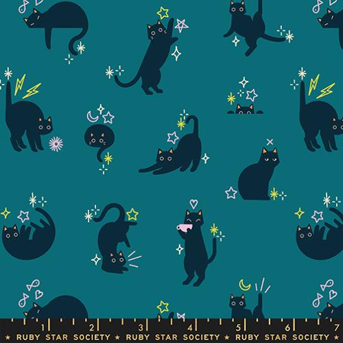 Pattern of black cats and stars on a blue background with a Ruby Star Society label.
