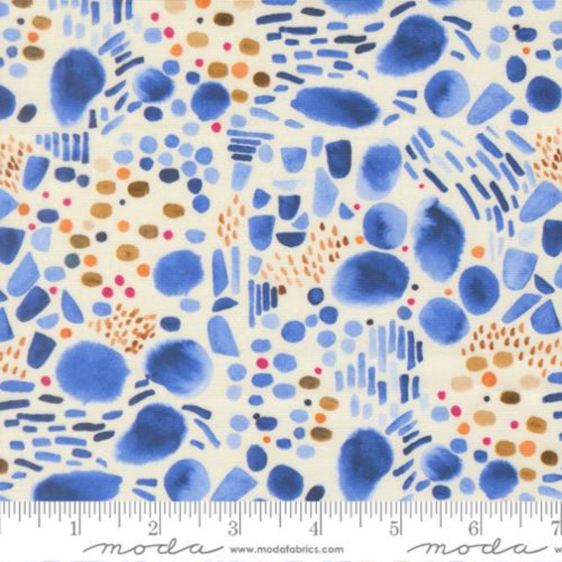 Fabric with blue and orange colorful abstract pattern on a white background.