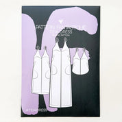 Pattern Fantasticè tea dress packaging with illustrations of dresses on a black and purple background.