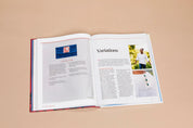 Open book with text and a photo on a beige background