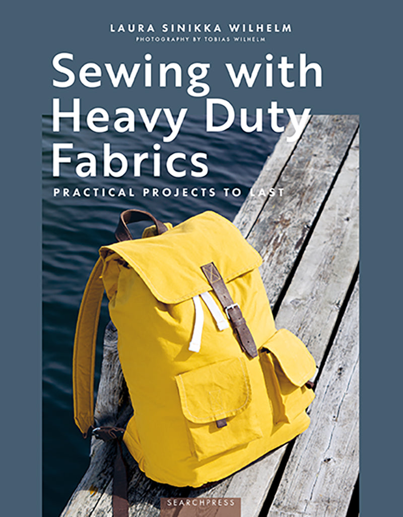 Book cover of 'Sewing with Heavy Duty Fabrics' featuring a yellow backpack on a dock.