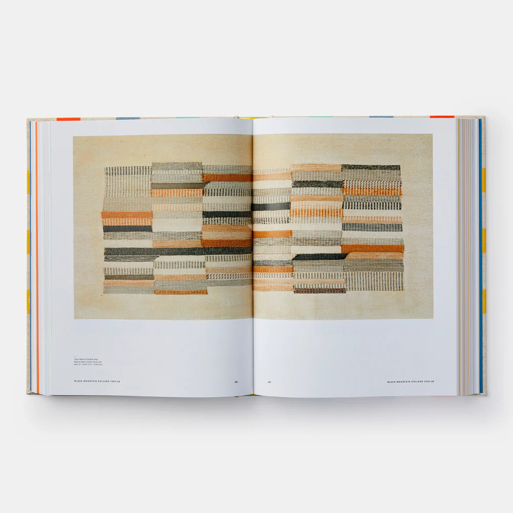 Open book displaying a patterned design on a white background