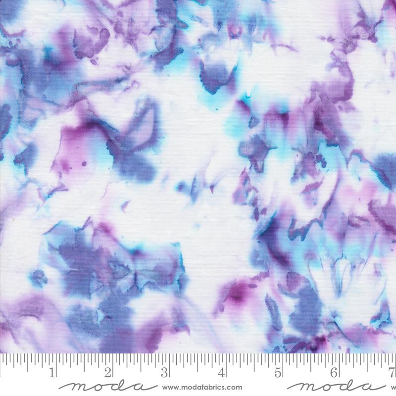 Batik fabric inshades of blue and purple on white