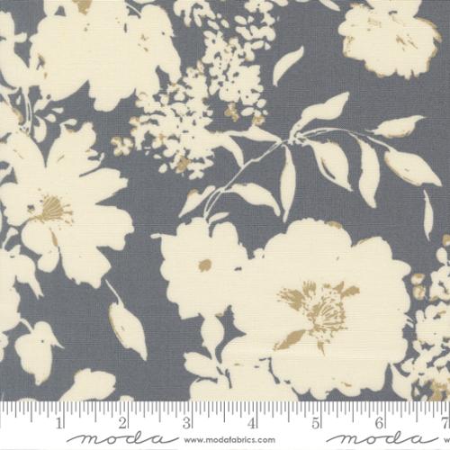Floral fabric pattern with beige flowers on a dark blue background, featuring Moda label.
