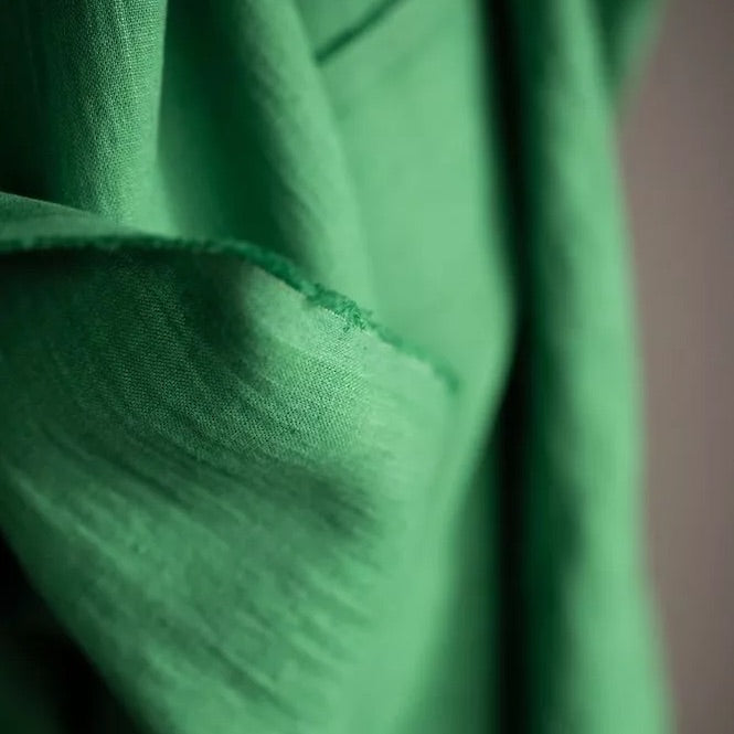 emerald green linen fabric with a soft drape