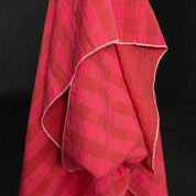 Red checkered towel on a black background