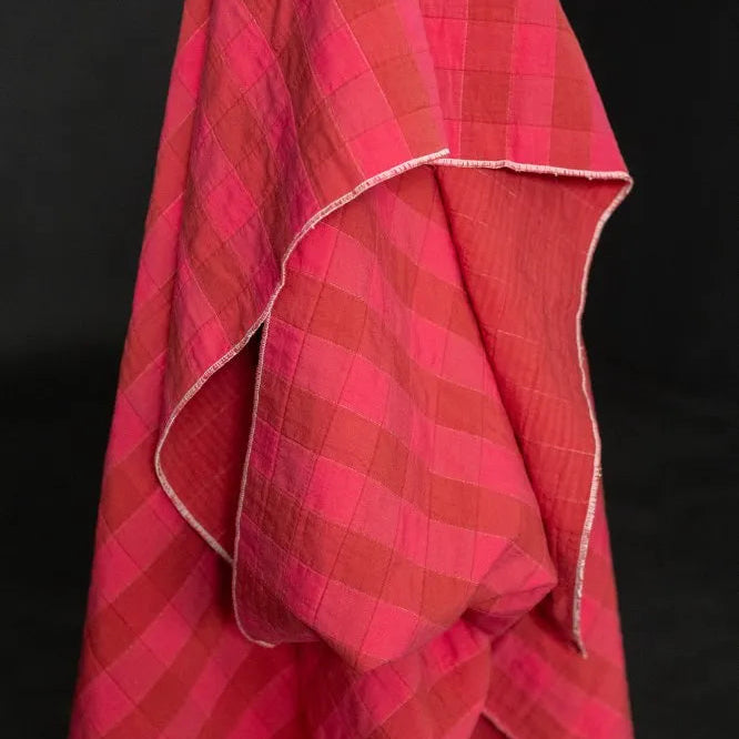 Red checkered towel on a black background