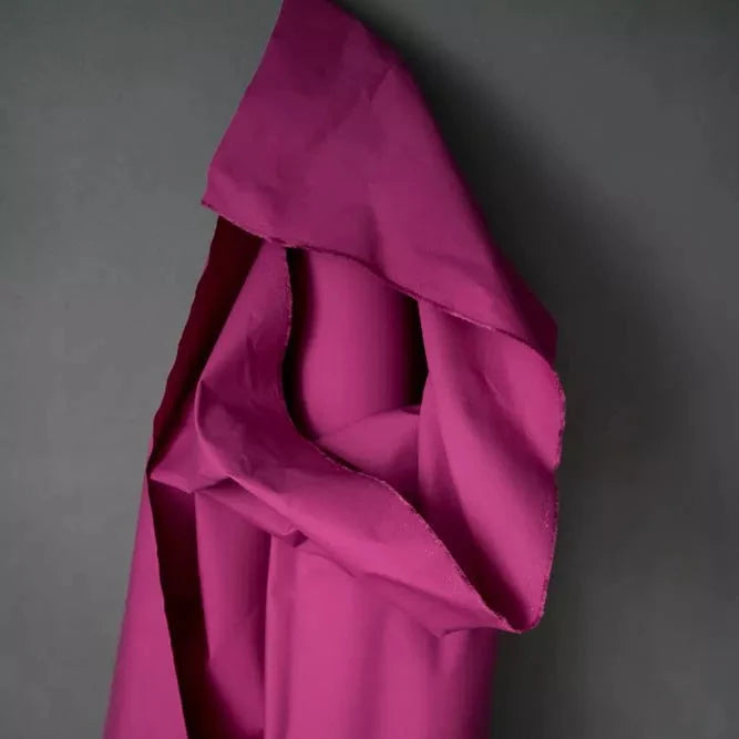 Draped dry oilskin in Magenta