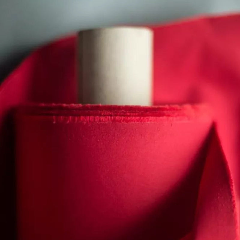 Close-up of red fabric with a neutral background