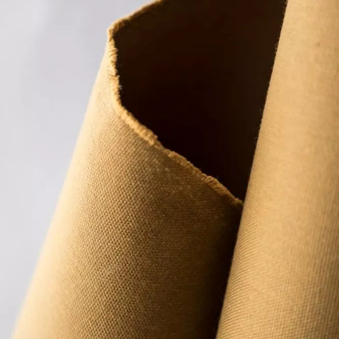 Closeup of heavyweight dry oilskin in tan