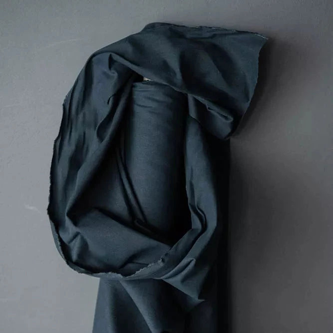 Draped linen/cotton dry oilskin in indigo