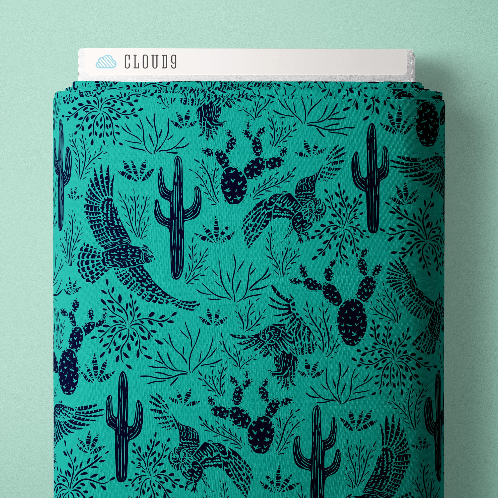Turquoise background with navy desert plants and raptors 