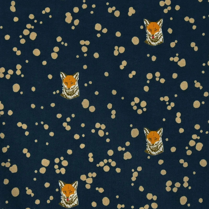 Fox heads and pale yellow drops on dark teal background