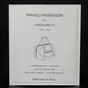 Francli Weekender hardware kit packaging with black and white design on a dark background