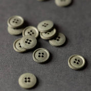 Green buttons scattered on a gray background