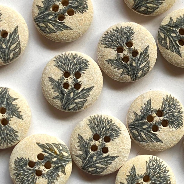 Buttons with leaf pattern on a white background