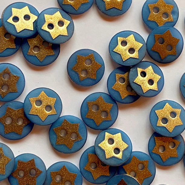Blue buttons with gold star designs on a white background