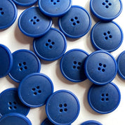 Multiple blue buttons on a white background