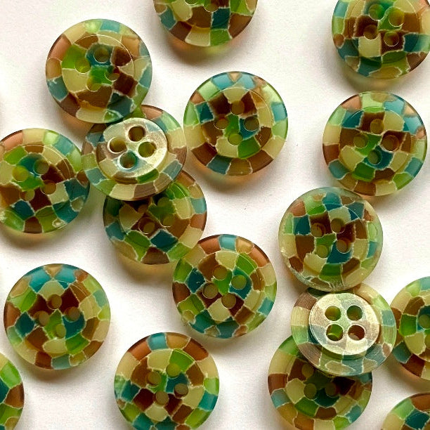 Set of mosaic-patterned buttons on a white background