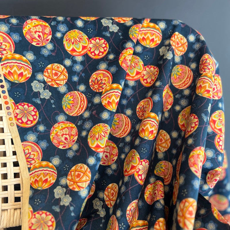 Colorful fabric with decorative patterns on a blue background