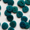 Multiple blue buttons on a white background