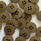 Brown buttons with four holes on a white background