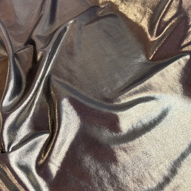 Close-up of crumpled metallic fabric with a sheen