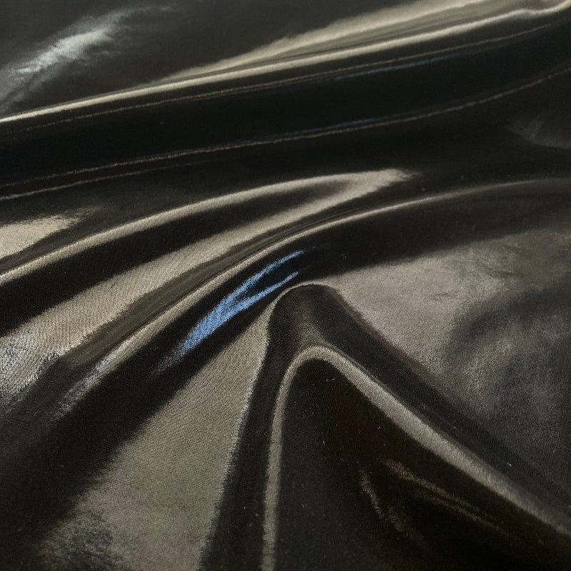 Close-up of black fabric with folds