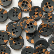Collection of khaki buttons with brown accents on a white background