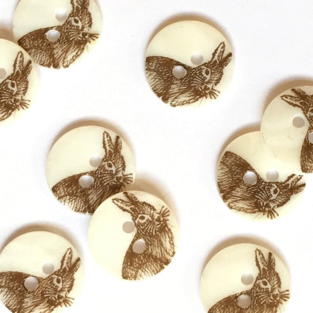 Buttons with rabbit illustrated buttons on a white background