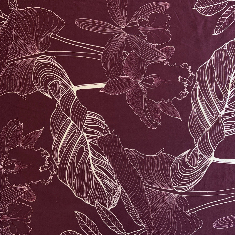 White floral outlines on a dark purple background